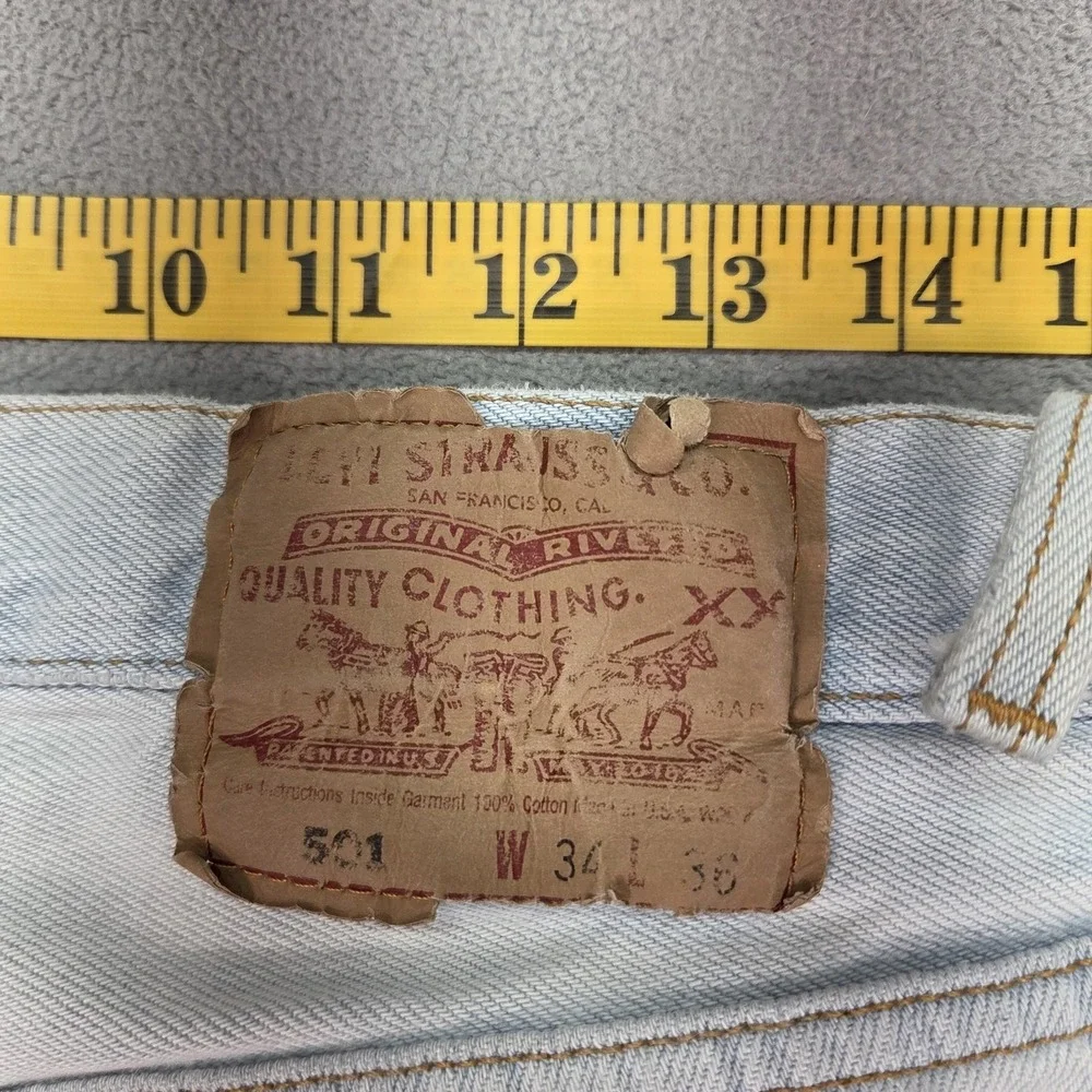 Vintage Levis 501 Jeans Mens Light Blue Straight Made USA Stains Fits 32x34 Flaw